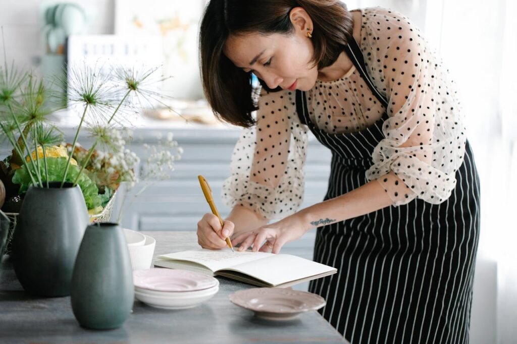 Woman keeping food dairy 