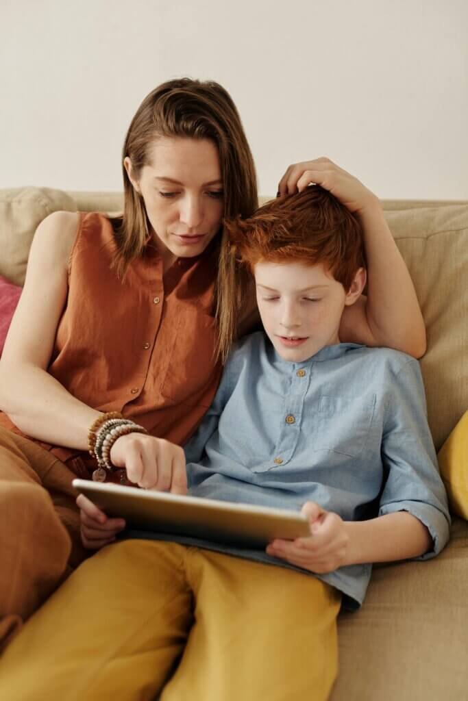 Nonverbal autistic child communicating by using AAc device