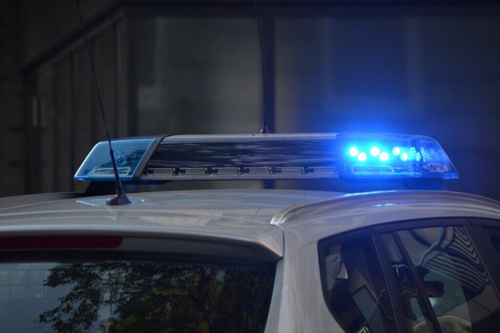 Police car representing dangers of lack of training in police and nonverbal autism interaction